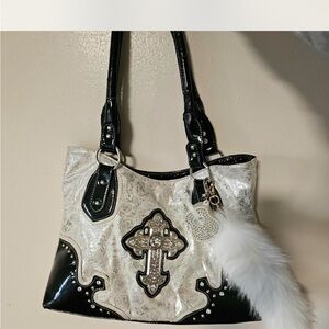 Elegant Black and White Handbag with Cross Design
